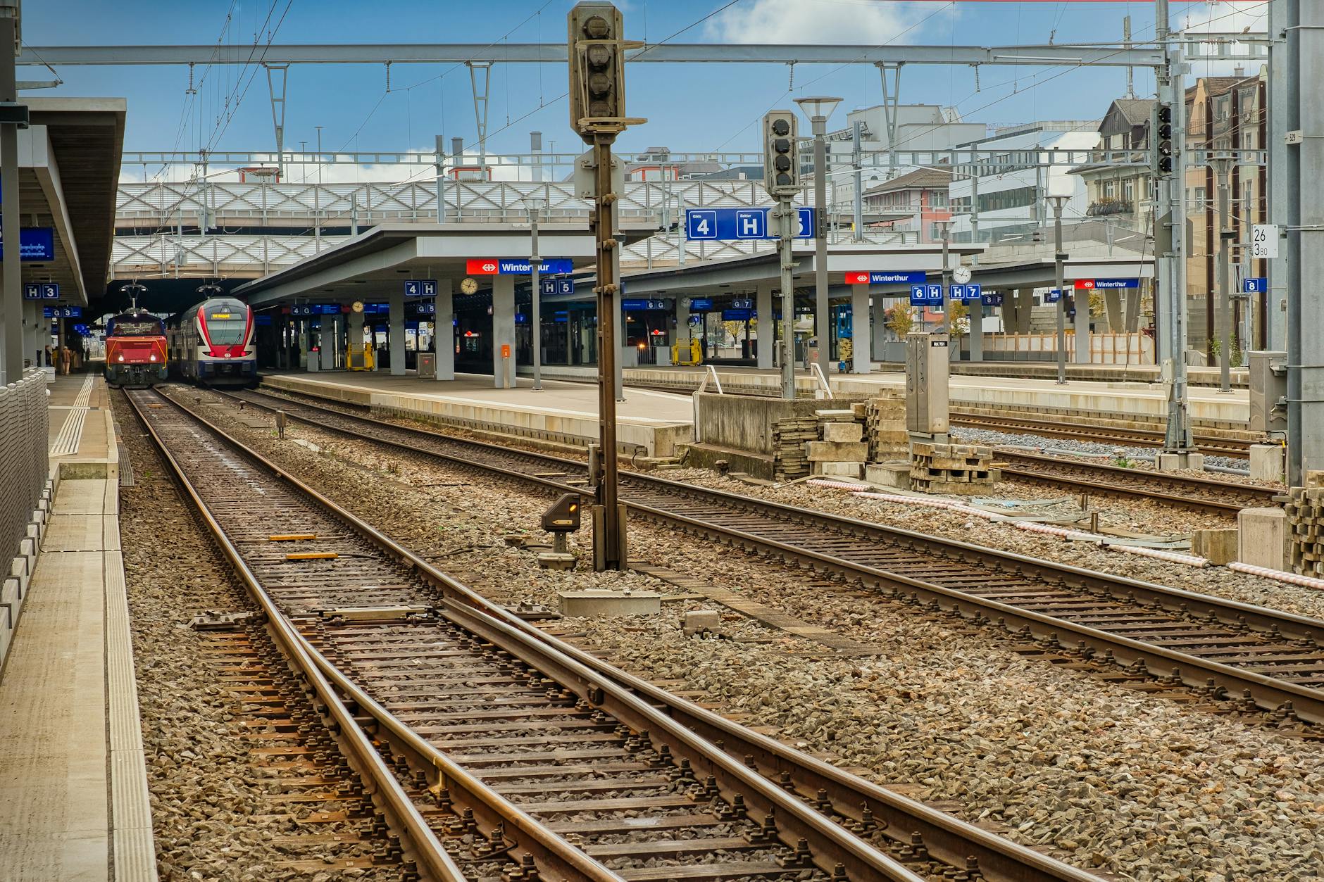Swiss train station context for investor travel and confidentiality planning.
