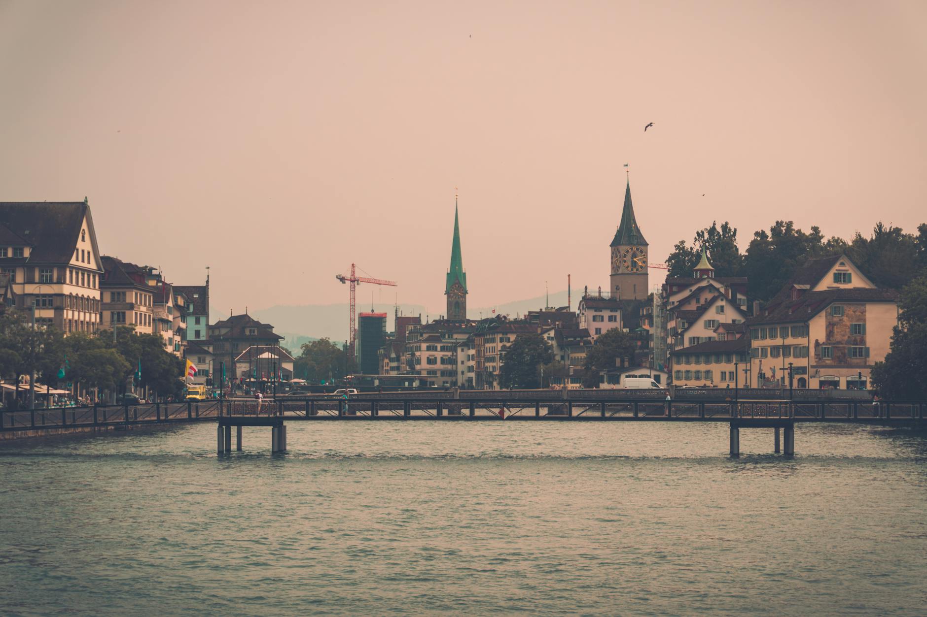 Zurich skyline reflection context for transit and reporting windows.