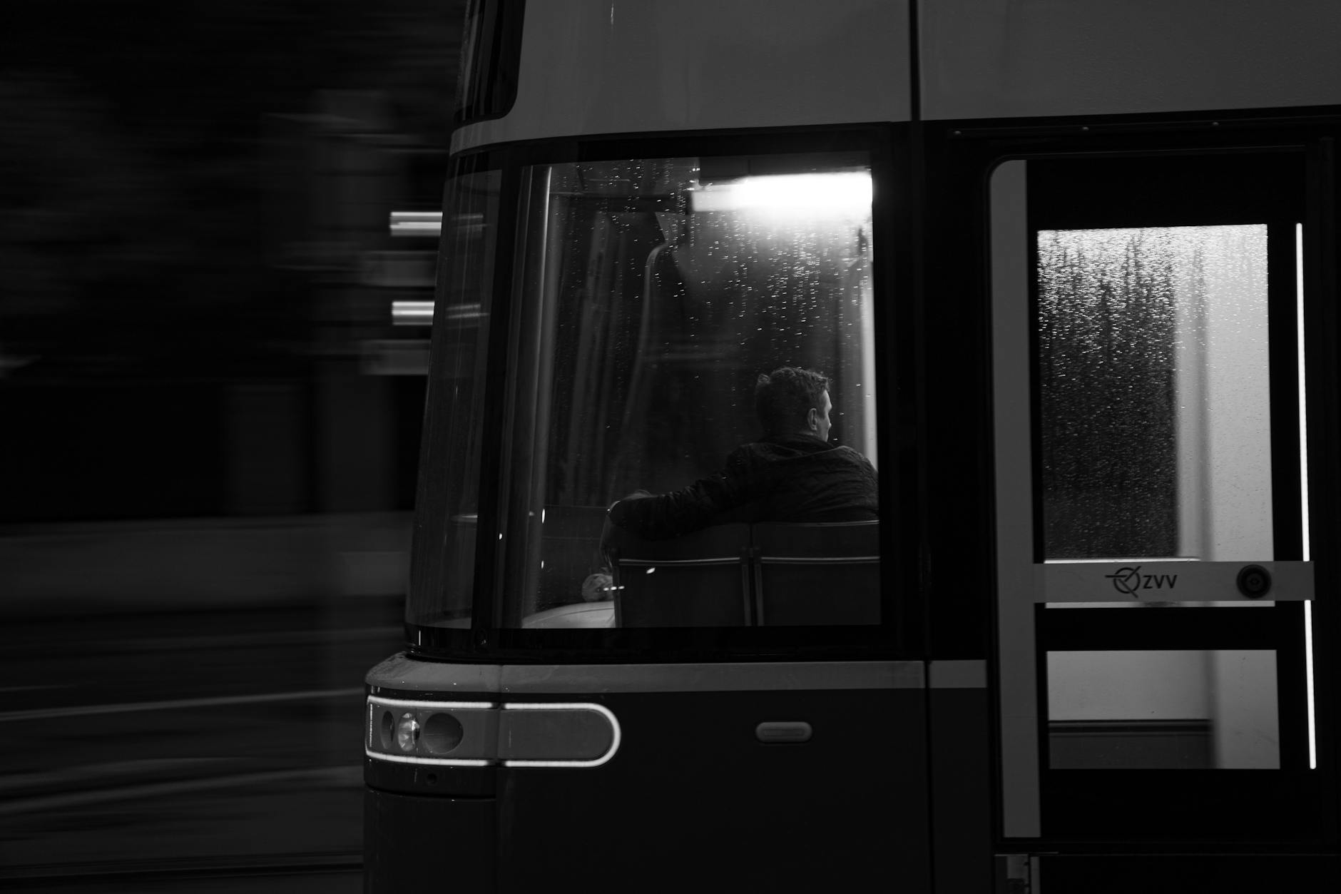 Zurich tram at night context for nightlife movement and return routes.