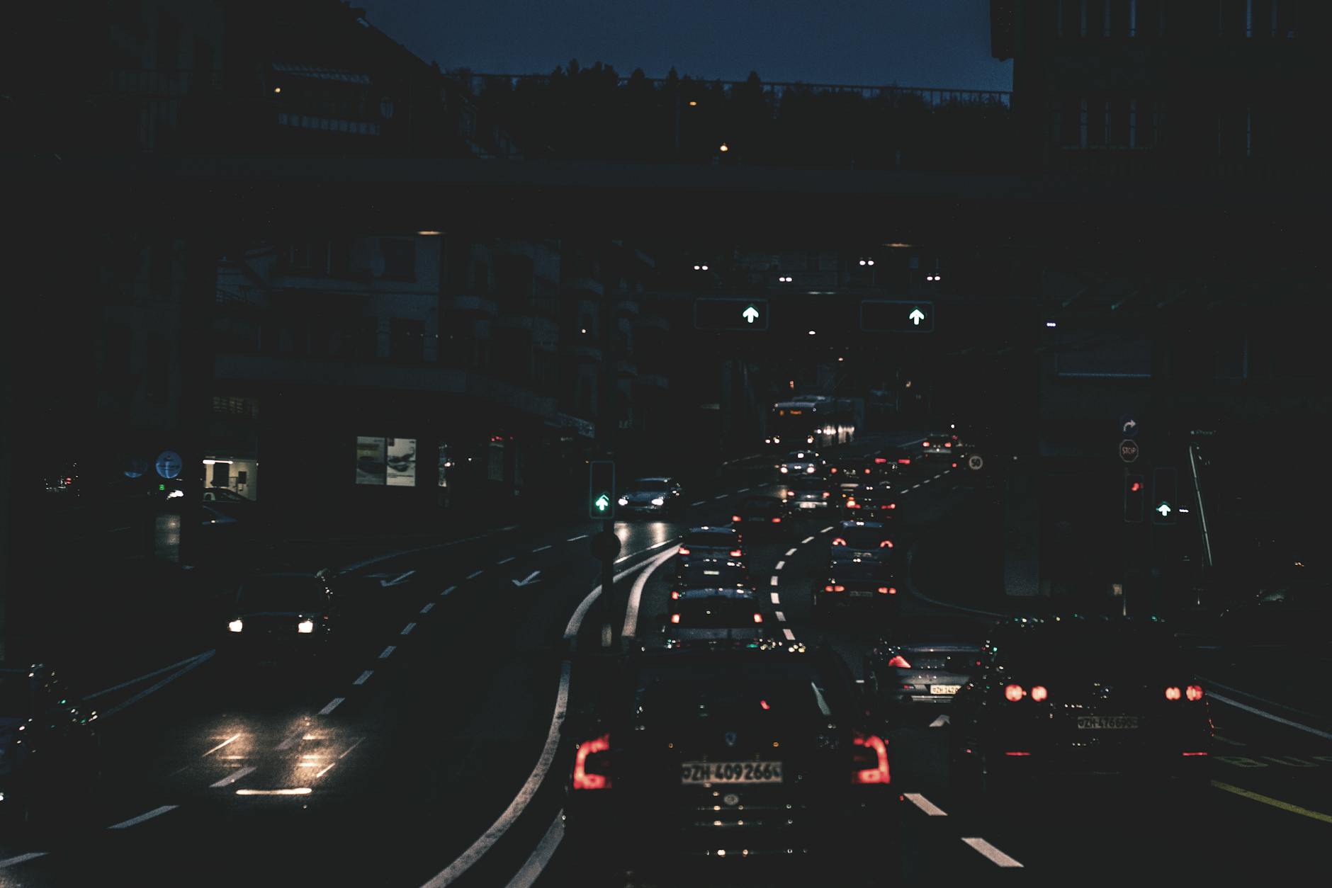 Zurich traffic and city lights at night context for late transport planning.