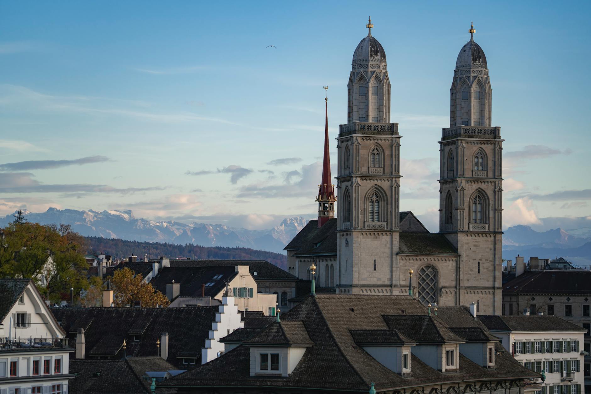 Grossmunster and the Swiss Alps context for religious itinerary design in Zurich.