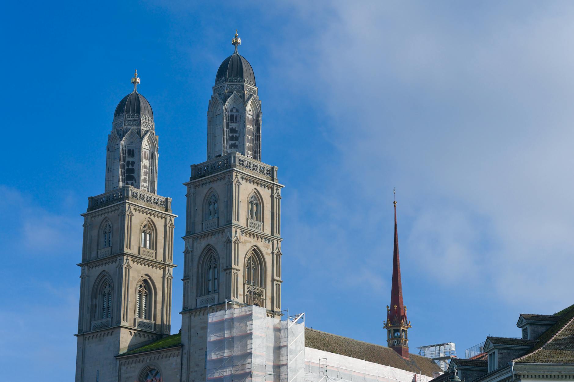 Grossmunster church towers context for Zurich worship time and access planning.