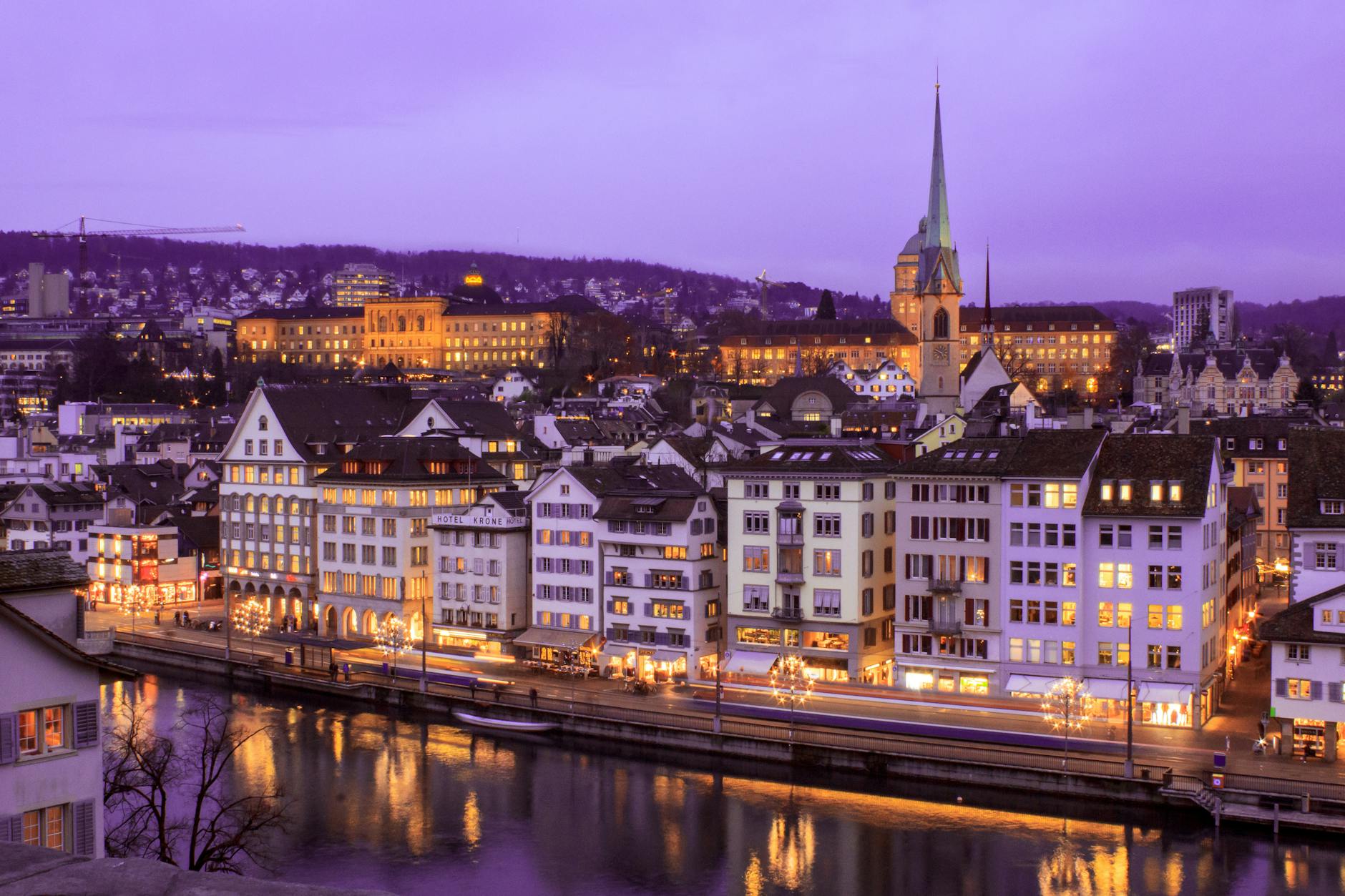 Zurich twilight riverfront context for solo evening planning.