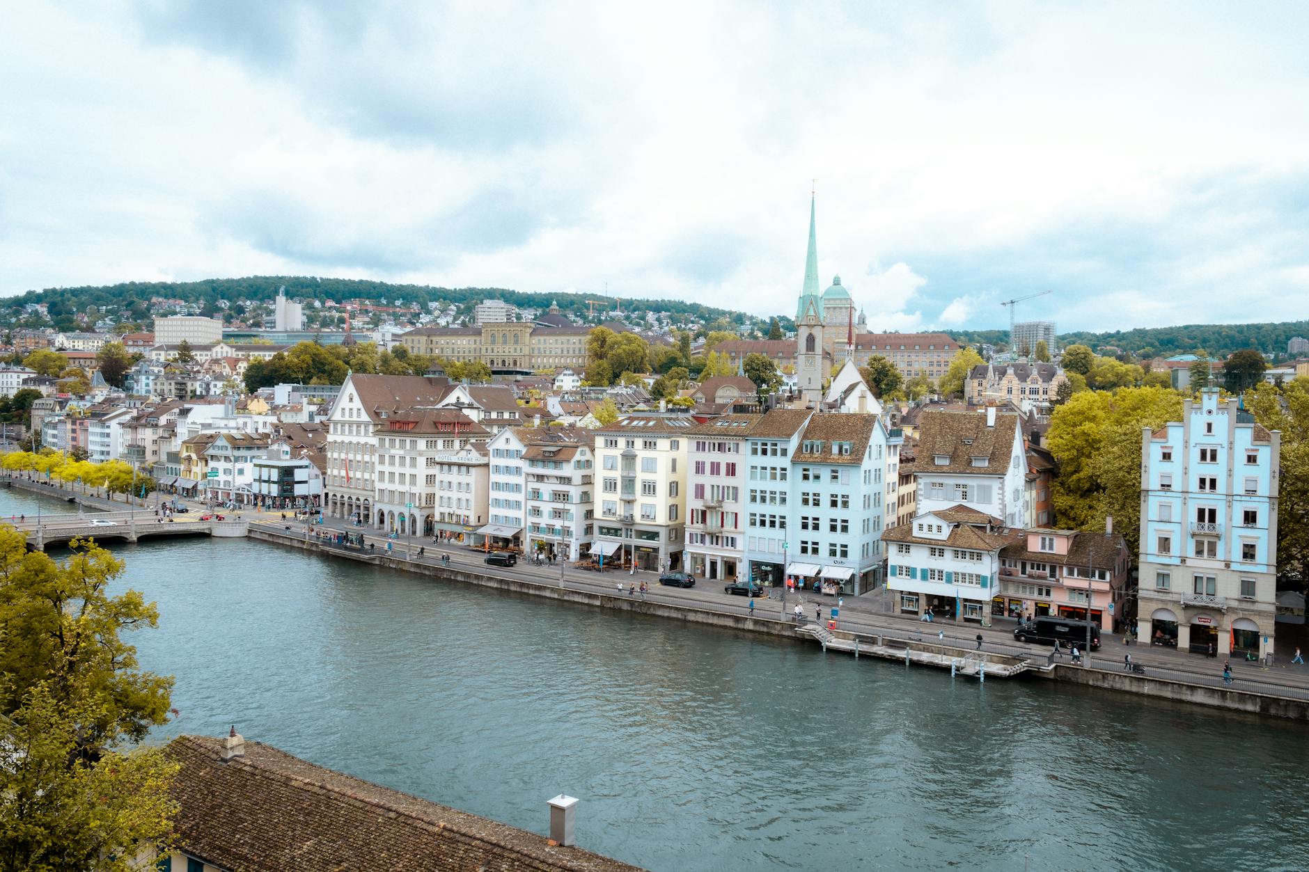 Zurich riverfront buildings context for arrival and hotel base decisions.