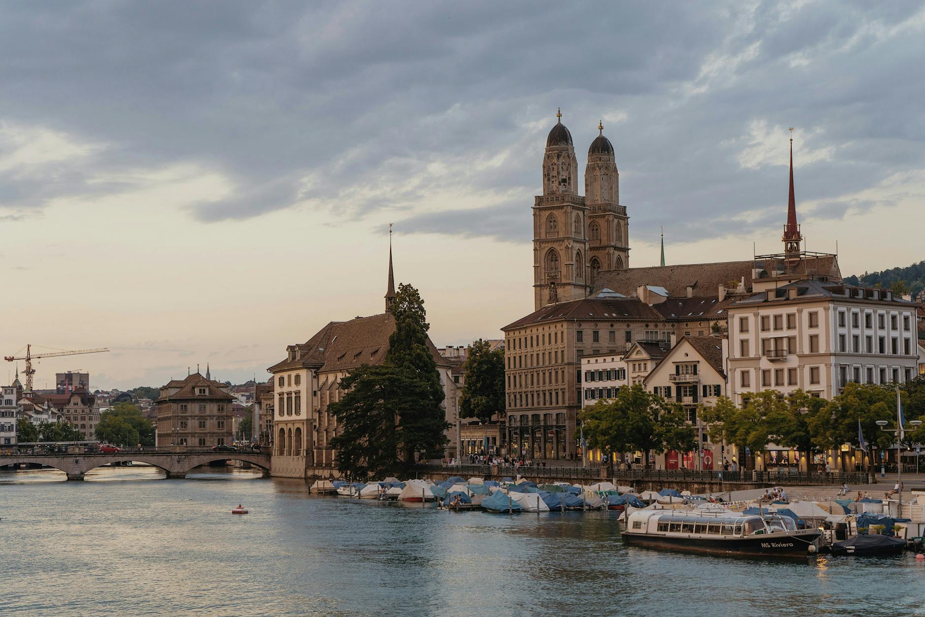 Zurich riverside at dusk context for tourist dining and cost planning.
