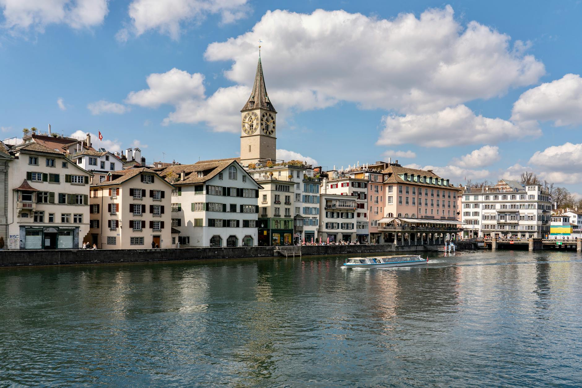 Zurich waterfront and church view context for choosing a scenic add-on.