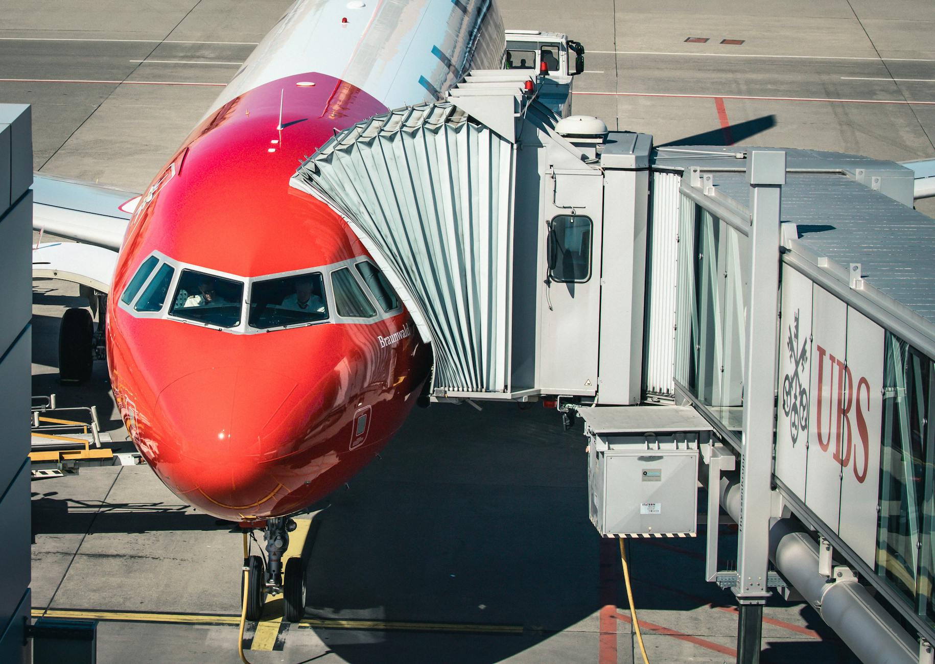 Aircraft at a Zurich Airport gate context for fatigue-aware stopover choices.