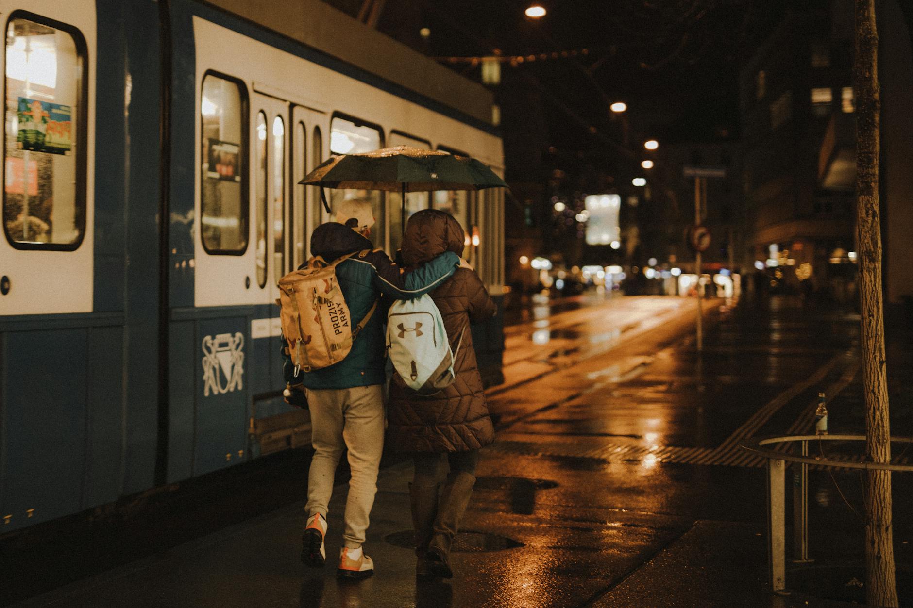 Rainy Zurich tram context for clothing and weather planning.