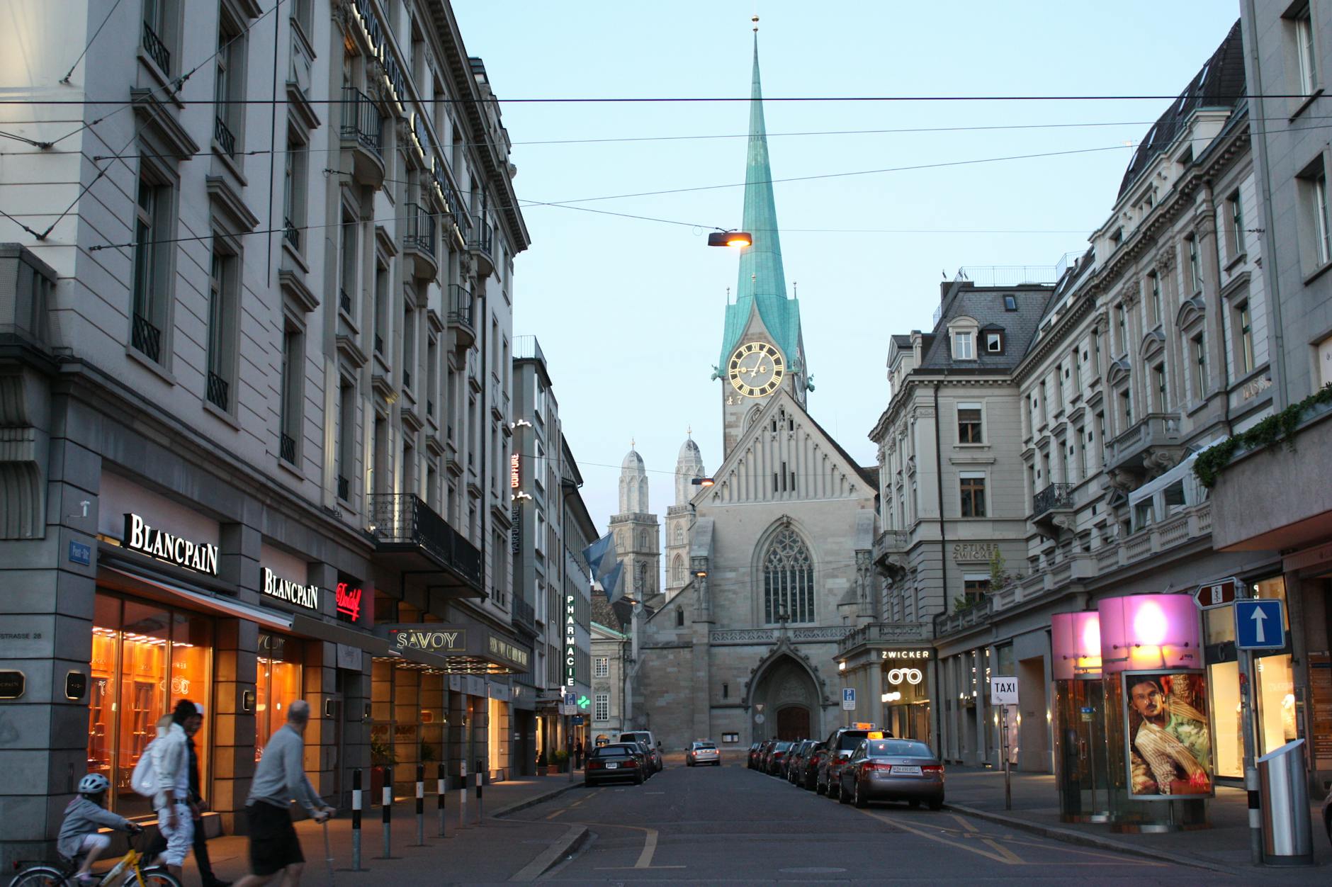 Zurich evening street and Fraumunster context for woman traveler report planning.