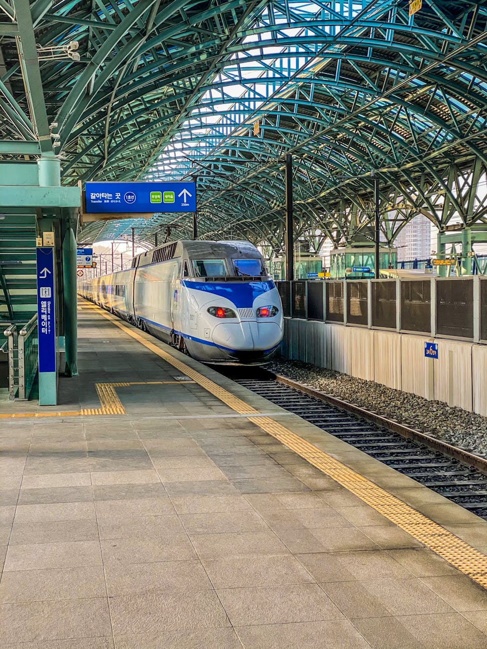 High-speed train arriving at Asan station.