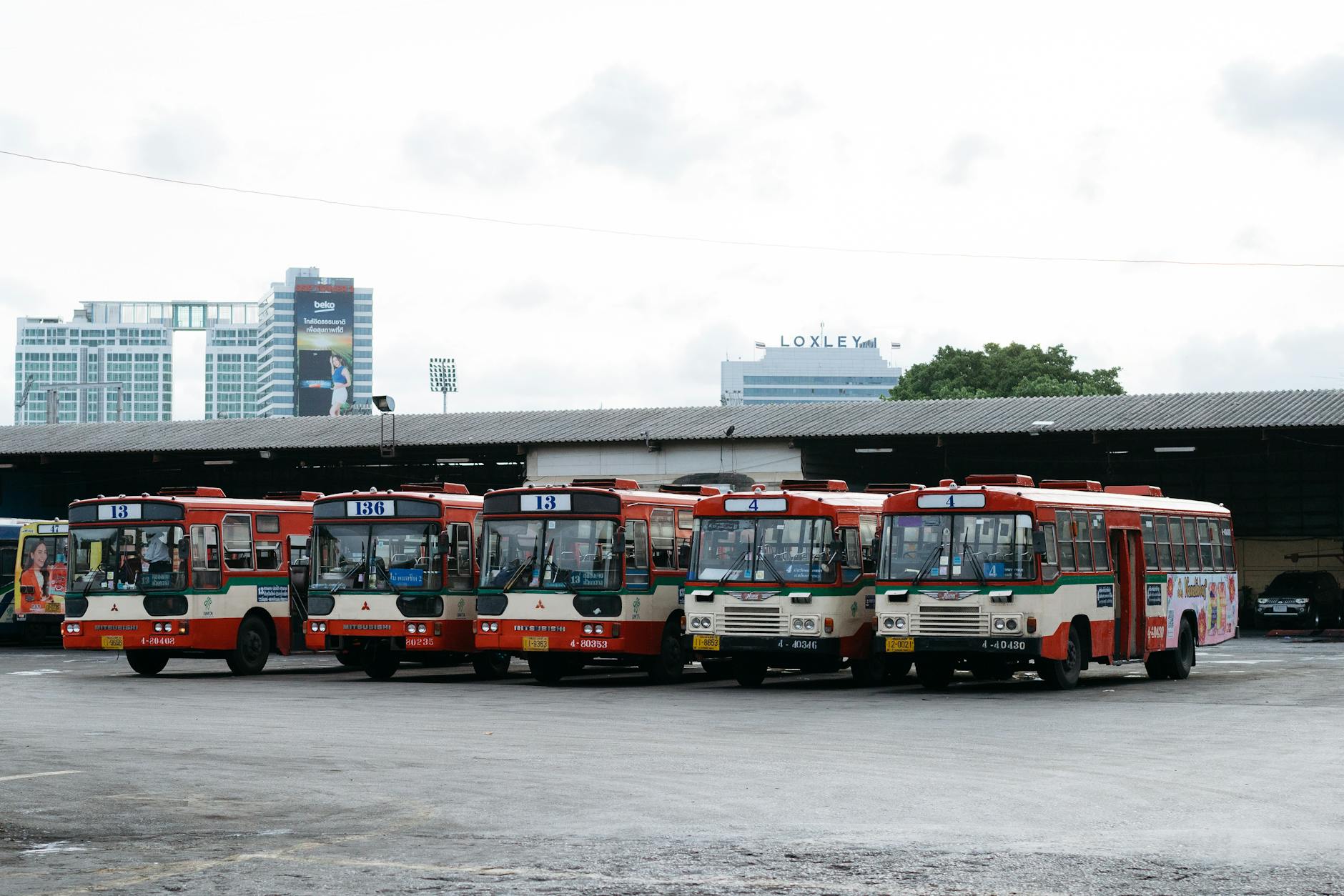 Public buses lined up in Thailand.