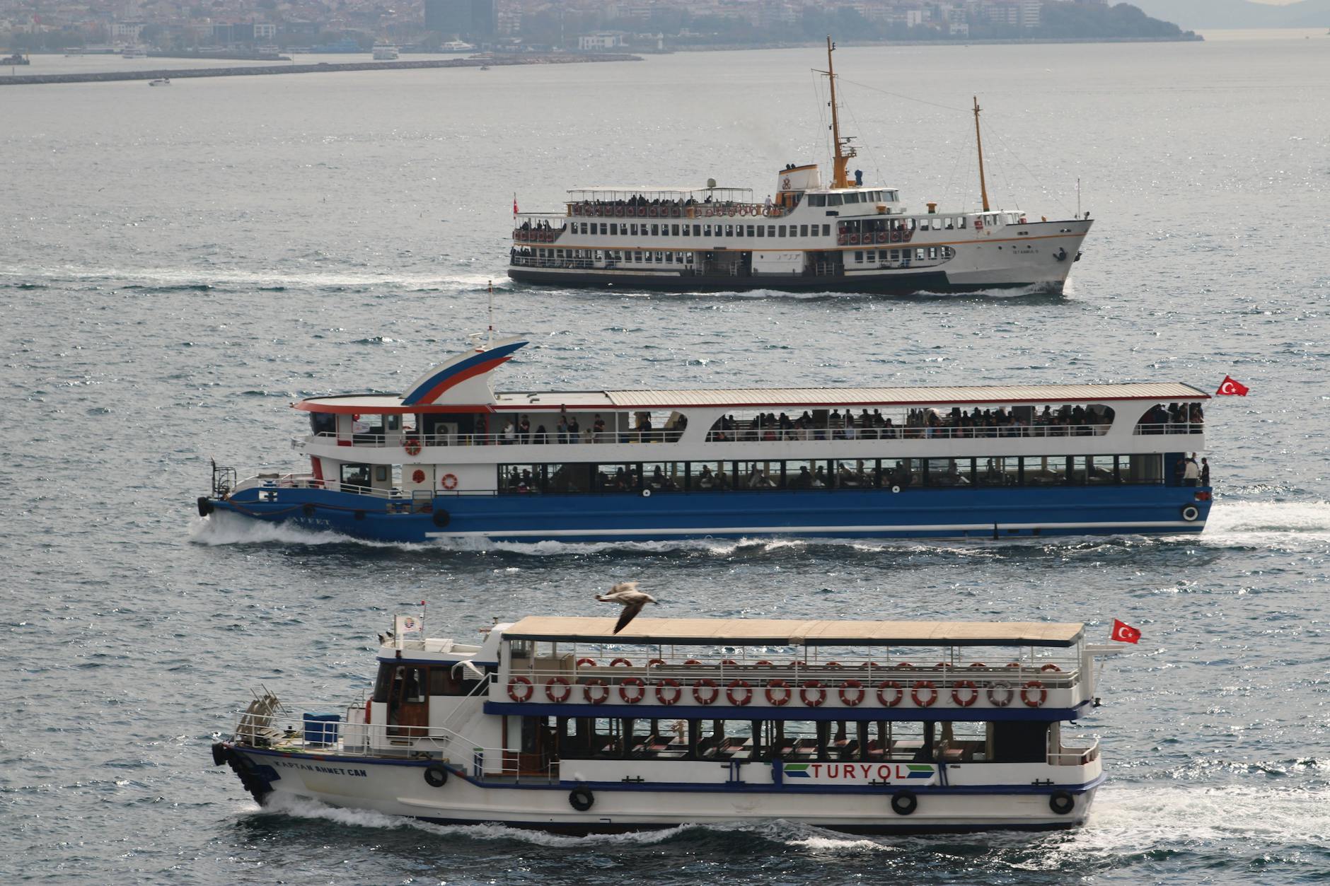 Passenger ferries crossing the Bosphorus in Istanbul.