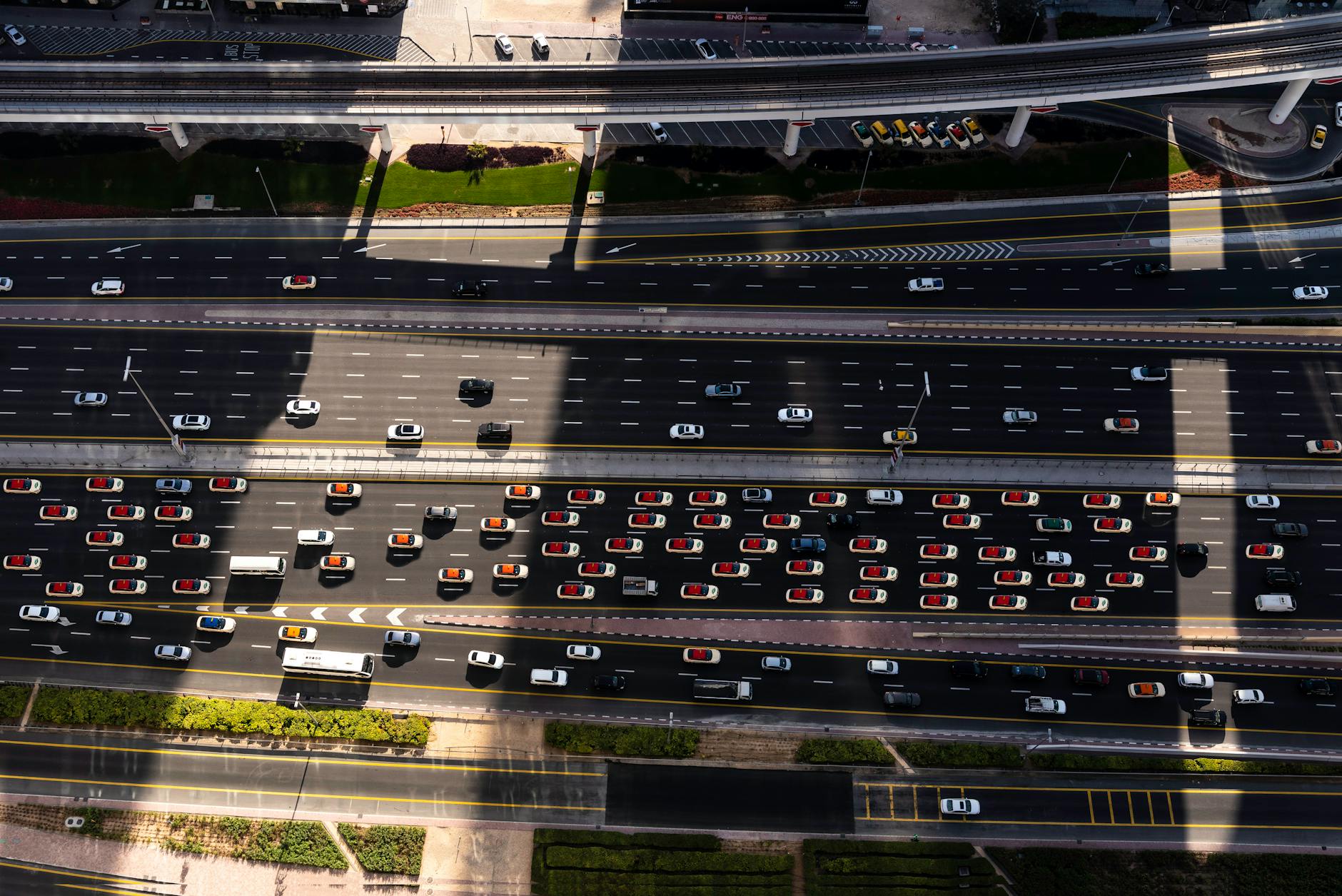 Dense Dubai highway traffic seen from above.